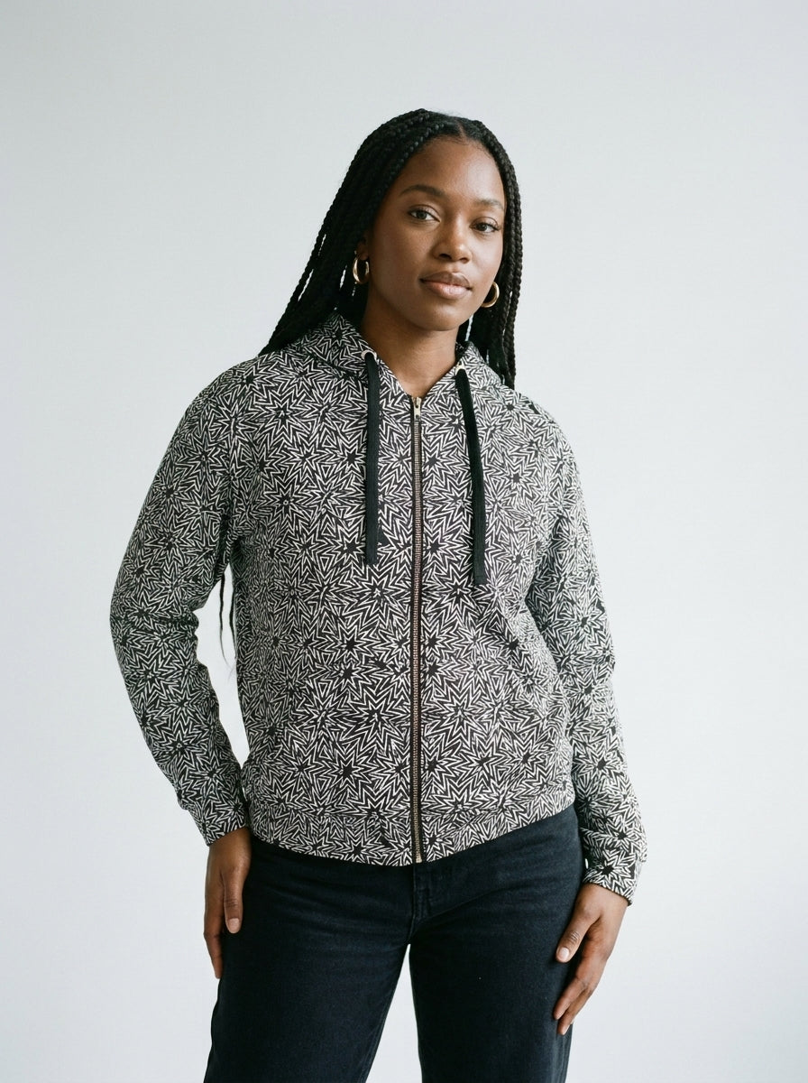 Model wearing the BOOM! graphic hoodie by Design Hero, analog film photo