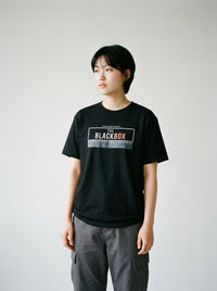 Model wearing The Black Box film tee by Design Hero, analog film photo
