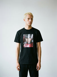 Model wearing the Blood Shadow cyber samurai tee by Design Hero, analog film photo
