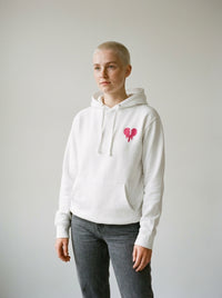 Model wearing the Broken Heart hoodie by Design Hero, analog film photo