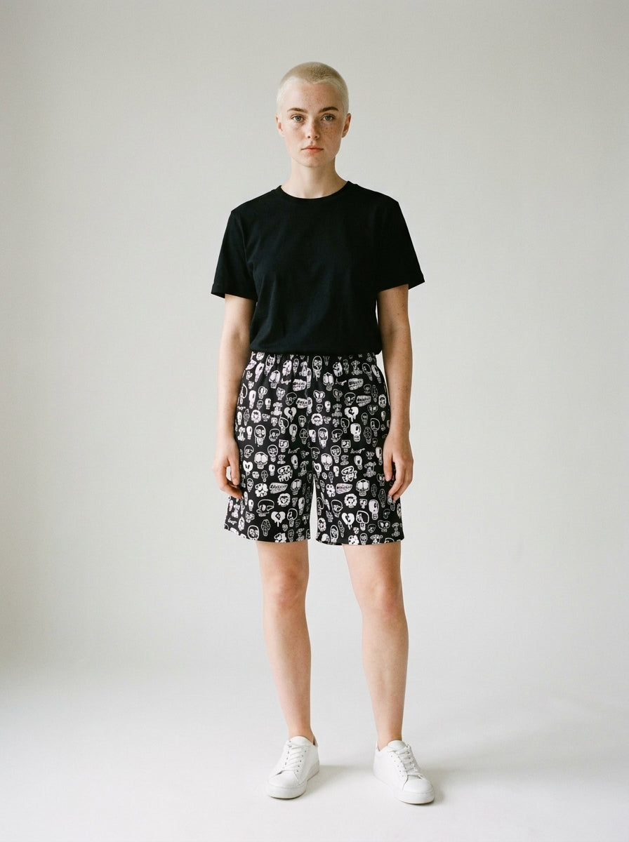 HERO Skulls All-Over Print Recycled Athletic Short worn by a model