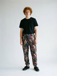 HERO Unisex Spray Paint Print Track Pants: Express Your Artistic Style worn by a model