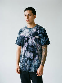 Model wearing the oversized tie-dye tee by Design Hero, analog film photo