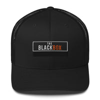 The Black Box trucker cap in black with mesh back and embroidered front patch – premium unisex cap for filmmakers