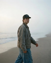 The Black Box Trucker Cap by Design Hero – lifestyle