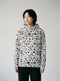 Model wearing the Skulls hoodie by Design Hero, analog film photo