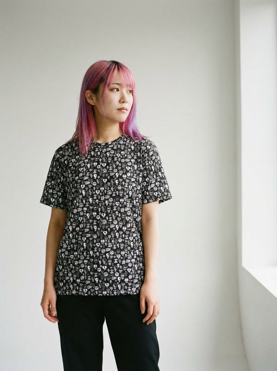 Model wearing the Skulls tee by Design Hero, analog film photo
