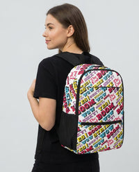 Woman wearing the Strike utility backpack by Design Hero, comic pop art all-over print, studio photo