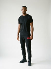 Ultimate Comfort and Style: Unisex Fleece Sweatpants by HERO worn by a model